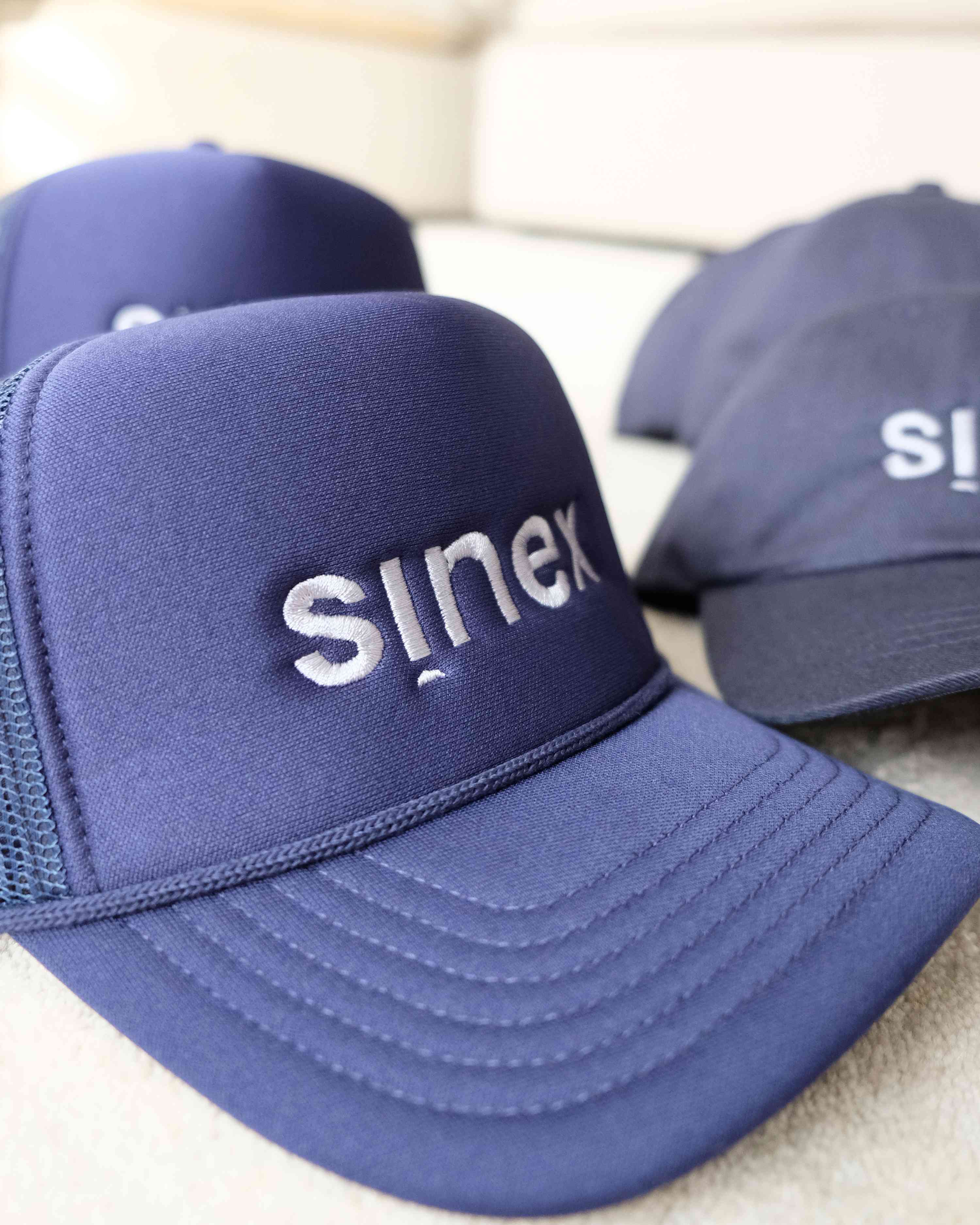 SINEX Construction — Broderie + Impression sur Polos, t-shirts, Montréal
